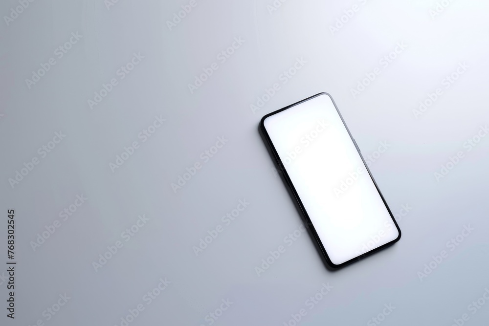 Poster a sleek modern smartphone with a blank white screen displayed prominently on a neutral gray backgrou