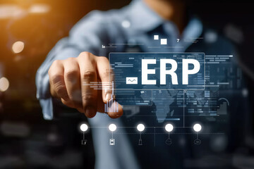 A person, likely a businessman, is pressing a button labeled ERP on a device or computer, indicating engagement with Enterprise Resource Planning software. - 768314100