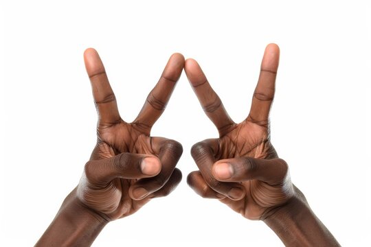 Two African hands against white background forming 'W' sign in American Sign Language, symbolizing communication, diversity, and inclusivity