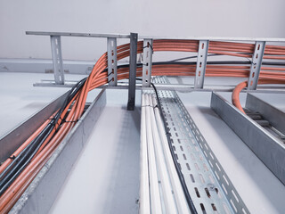 Obraz premium Cable connecting the power from the solar panel to the inverter. industrial power wiring solar panel. 