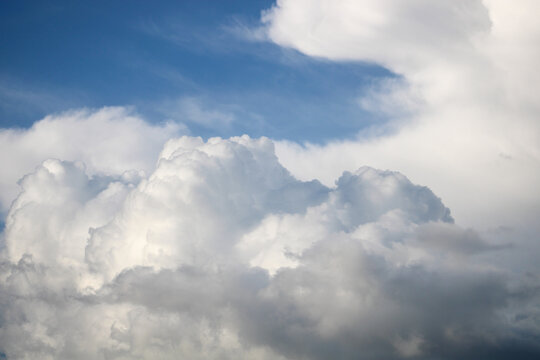 a large cloud that is in the sky. cumulus clouds. cumulonimbus