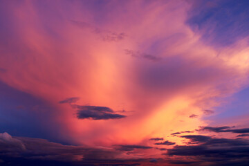 Colorful clouds at sunset. dance of clouds. purple and pink colored clouds. Dramatic and romantic sky.