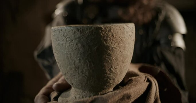 Close up of ancient looking holy grail - cinematic