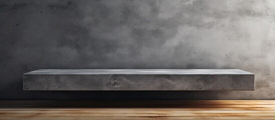 Simple concrete bench placed inside a room featuring a textured concrete wall in the background