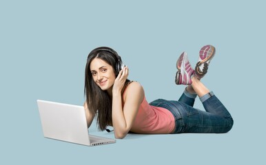 portrait of a happy beautiful young girl with laptop