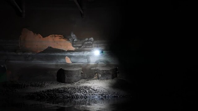 Inspection drone with bright light fly inside coal power plant container tank