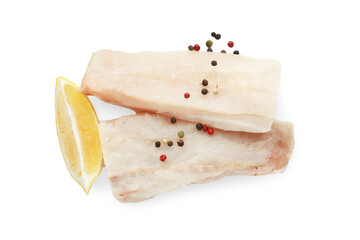 Fresh raw cod fillets with peppercorns and lemon isolated on white, top view