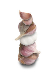 Stacked heads and cloves of garlic on beige background