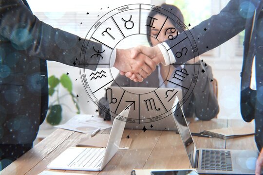 Men shaking hands in office. Business partner compatibility horoscope