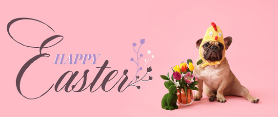 Fototapeta premium Cute French bulldog in chick hat with beautiful flowers and toy bunny on pink background. Easter celebration