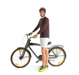 Fototapeta premium Young male cyclist with bicycle isolated on white background