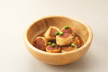 Gohyong or Ngo Hiang, made from minced chicken with flour, served with sour sauce
