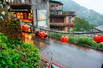 Fototapeta premium Jiufen, New Taipei, Taiwan, Republic of China, 01 22 2024: The landscape of Jiufen old street and pacific ocean 