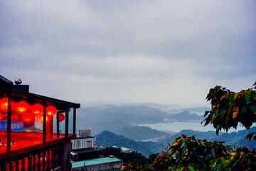 Jiufen, New Taipei, Taiwan, Republic of China, 01 22 2024: The landscape of Jiufen old street and pacific ocean © Feng