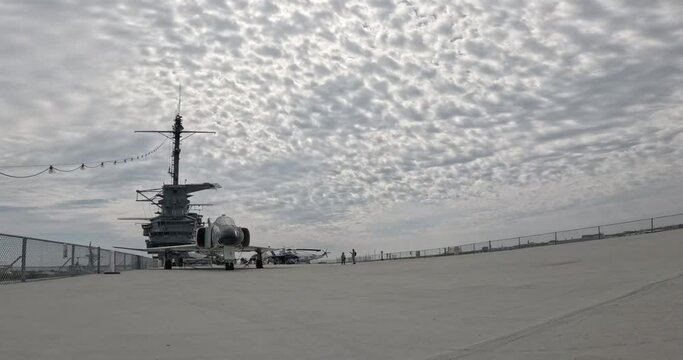Flight deck of the USS Yorktown 2024 clouds above.