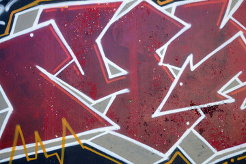 Colorful background of graffiti painting artwork with bright aerosol outlines on wall. Old school...