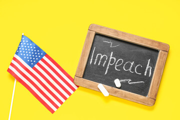 Chalkboard with word IMPEACH and USA flag on yellow background