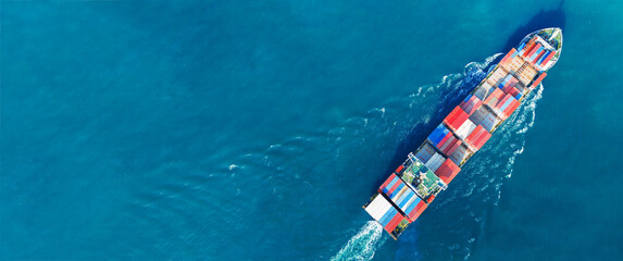 Aerial view of cargo ship with contrail in the ocean sea ship carrying container and running from container international port smart freight shipping by ship service - obrazy, fototapety, plakaty