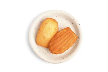 Keuken spatwand met foto Saucer with tasty Madeleine cookies on white background © Pixel-Shot