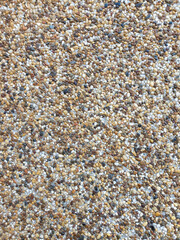 small pebbles stone wall texture