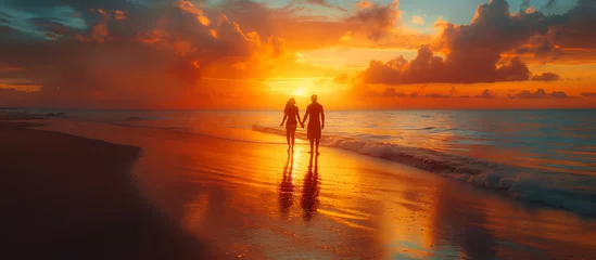 Fensteraufkleber couple, sunset at the beach © Creative-Touch