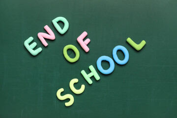 Text END OF SCHOOL on green background. Top view