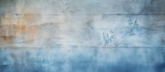 A close up of an electric blue concrete wall with a blurred natural landscape background, featuring...