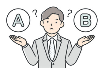 AとBの比較をするビジネスマン