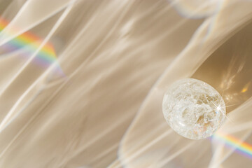 Quartz Prism's Rainbow Reflection at sunlight, close up of clear quartz crystal captures prismatic...