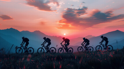 Silhouette cyclists enjoy a leisurely mountain meadow ride at sunset