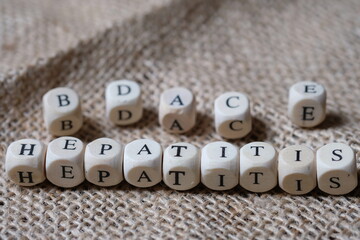 Hepatitis word on wooden cubes blocks concept. wood blocks. 