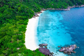 Fototapeten Aerial view of the Similan Islands, Andaman Sea, natural blue waters, tropical sea of Thailand. the beautiful scenery of the island is impressive © Photo Sesaon