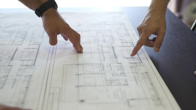 Following an architect&rsquo;s finger across a detailed home plan, the journey of architectural design unfolds