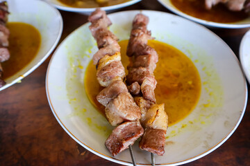 Sate Klathak, an uniq young goat or mutton satay dish with steel skewers that served with curry soup. Originally from Yogyakarta, Indonesia