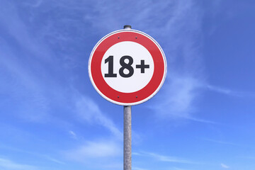 3d rendering of a traffic sign - 18 sign warning symbol - In the background a blue sky with clouds. 18 plus - censored - eighteen age older adult content. - 768431921