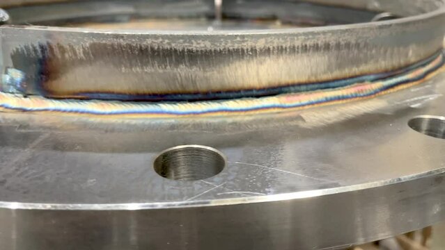 Welding seam on a pipeline close-up, front view.