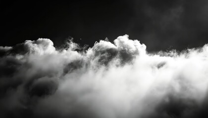 Dramatic black and white cloud formation - A high-contrast image capturing the intense texture of clouds against a dark sky, evoking a sense of tension or storm brewing