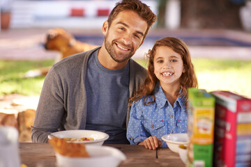 Dad, girl and breakfast in garden with portrait and smile for fathers day with family, kids and nutrition at home. Man, kid and cereal meal in house backyard with joy, children and happiness