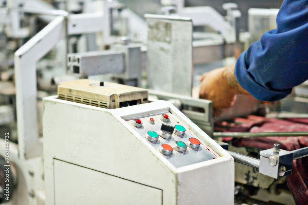 Poster Machine, worker and hand with buttons in factory for printing process, manufacturing and production. Closeup, cnc operator and employee in workshop with electronic controller for commercial industry