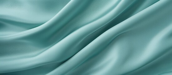 Fototapeta premium Detail of a blue cloth featuring an intricate and elongated pattern, suitable for backgrounds or textures in design projects