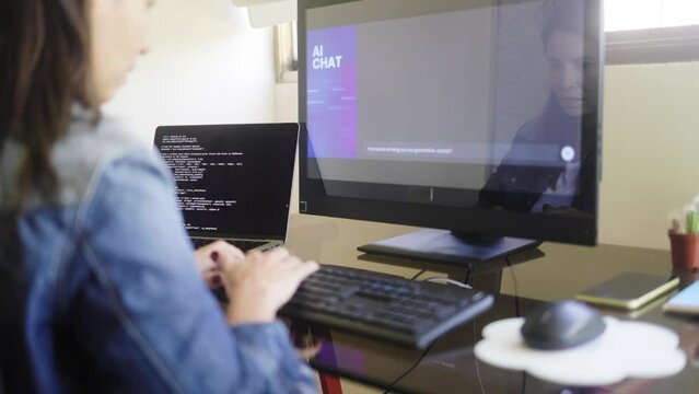 AI chat bot: Programmer using artificial intelligence for software development. Virtual robot technology trend