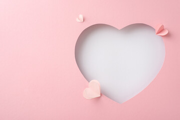 Mother's Day chic inspiration. Top view shot of delicate decorative hearts, showcased through a...