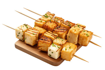 Several tofu skewers with toothpicks. The tofu pieces are threaded onto the skewers, ready to be grilled or served as appetizers. Isolated on a Transparent Background PNG. - obrazy, fototapety, plakaty
