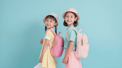 girls in pastel colors, wearing pastel costume,  happy back to school children. 