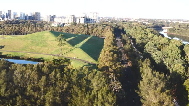 Aerial drone shot over a quiet highway near Sydney Olympic Park, Australia