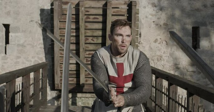 Fight scene on castle bridge with 14th century knights
