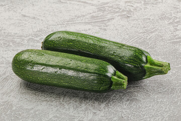Raw green ripe zucchini vegetable