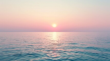 Fototapeta premium Fiery orange light paints the sky and reflects on the ocean waves as the sun dips below the horizon