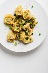Tortellini pasta with butter sauce.