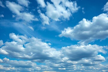 Blue sky background with white clouds,  Cumulus white clouds in the blue sky - obrazy, fototapety, plakaty